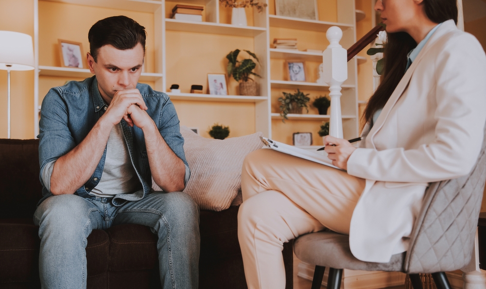 Psychotherapy,Treatment,Of,Depression.,Woman,Psychologist,Having,Session,With,Male